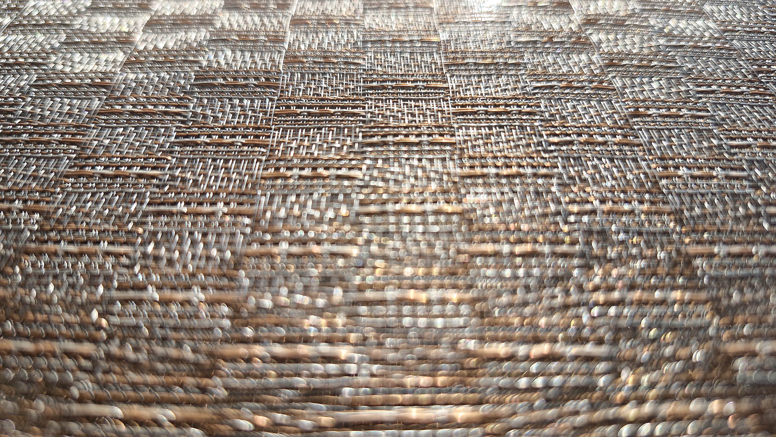 Woven copper surface detail — Jacquard-woven copper thread