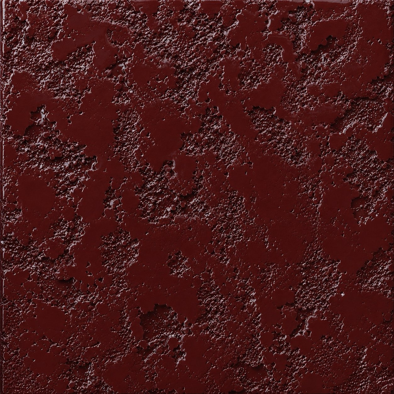 Ornam oxide relief panel in oxblood lacquer finish
